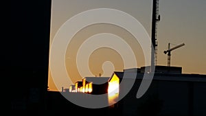 Industrial plant at sunset, silhouettes and light 5