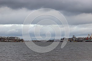 Industrial port of the city of Cherepovets, Vologda region, on an autumn windy day