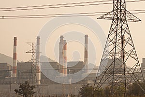 Industrial power plant with smokestack, the power plant production on hot condition in the mountain