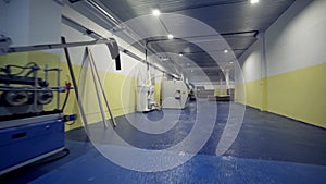 Industrial premises with factory machines. Action. Clean and spacious room with industrial modern automated machines and