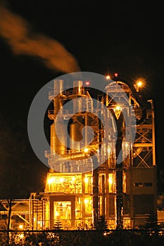 Industrial processes tower at night photo