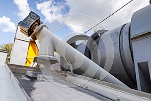 Industrial production of construction mixtures. Tower silos with bulk ingredients. Line for drying and sorting of sand