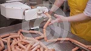 Industrial production of sausages. Food factory equipment.