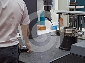 Industrial professional operate CMM measuring turbine