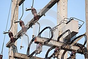 Industrial reduces power station. Power transformer on ceramic and porcelain insulators wire line