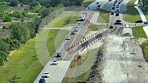 Industrial roadworks. Wide american highway under construction. Development of interstate transportation system for