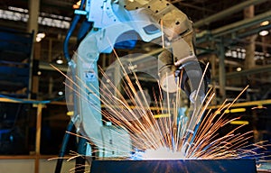 Industrial robot is welding assembly automotive part in car factory