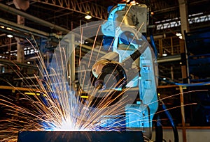 Industrial robot is welding assembly automotive part in car factory