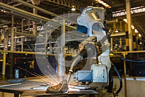Industrial robot is welding assembly automotive part in car factory