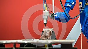 Industrial robotic welders weld the car body. Automobile production