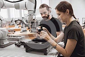 Industrial Robotics program university students learning education mechanical assembly with Robot Universal Training Platform