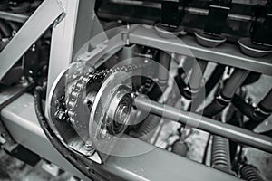 Industrial roller chain, technology background with selective focus