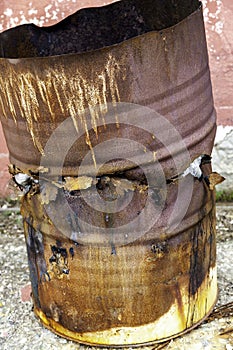 Rusty metal barrel photo