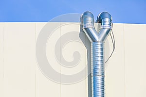 Industrial scale hood metal pipe. Infrastructure of the restaurants kitchen. Background