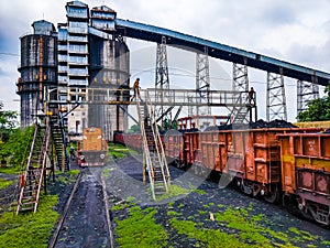 Coal Wagons getting coal from NTPC silos of Rajmahal Coal Mines , Jharkhand India