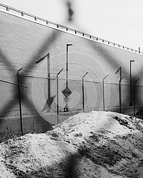 Industrial scene seen through a fence, in East Williamsburg, Brooklyn, New York City photo