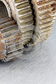 Industrial scratched metal background with grunge gear cogwheels