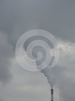 Industrial Smoke Pipe on a Grey Sky