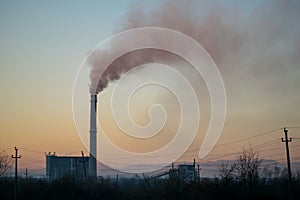 Industrial smoke stack of coal power plant. Burning coal.