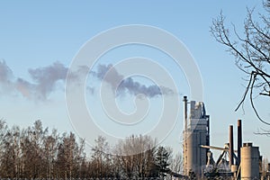 Industrial smokestack at winter, Finland