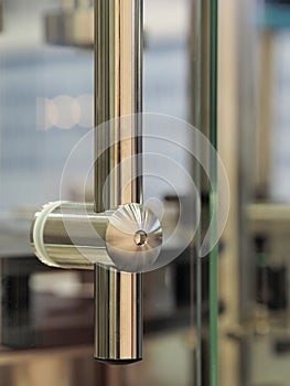 Industrial stainless grip on a machine door