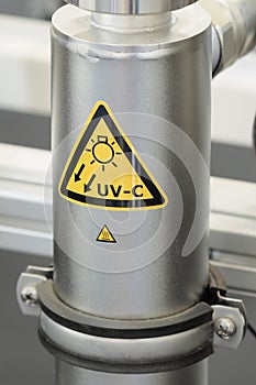 Industrial stainless steel container with UV radiation markings