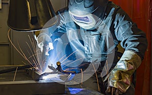 Industrial steel welder in factory