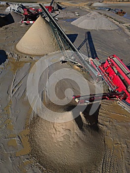 Industrial stone crusher machines on the sand quarry site aerial