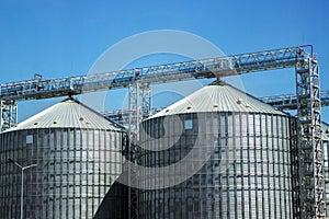 Industrial storage of raw materials in silos. Granary in the open sky