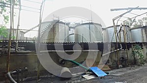 Industrial storage tanks outside the soap production unit