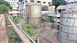 Industrial storage tanks at soap manufacturing factory