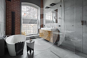 Industrial style in bathroom with big window