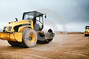 Tandem Road Roller vibroroller finishing the earth layer at road construction