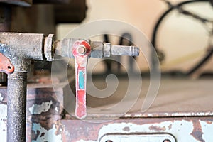 Industrial tap valve setting of old rustic machine