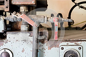 Industrial tap valve setting of old rustic machine