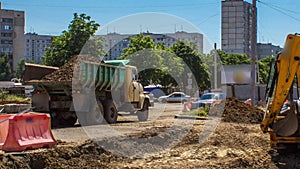 Industrial truck loader excavator diging ground timelapse