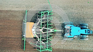 Industrial vehicle is carrying out planting of a field