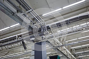 Ventilation and air conditioning systems in an industrial ceiling