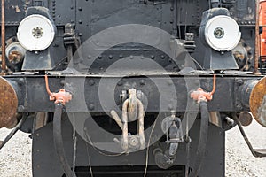 Industrial or vintage technology background featuring detail of old steam locomotive