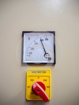 Industrial volt meter and switch.