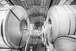 Industrial warehouse. Cold rolled steel coil in warehouse of plant. Production of steel sheets in rolls