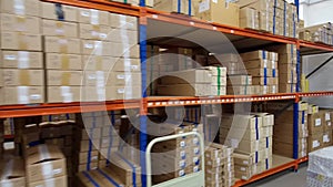 An industrial warehouse full of merchandising on shelving