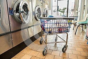 Industrial washing machines in a public laundromat