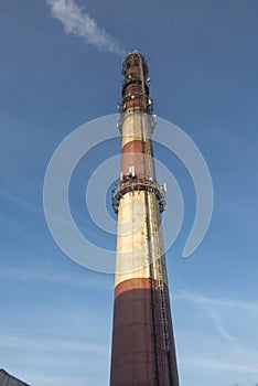 Industrial white, red, high concrete chimney