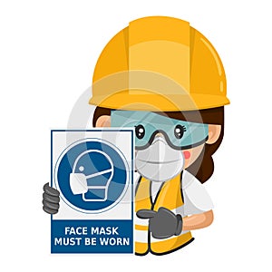 Industrial woman construction worker with a warning sign for the mandatory use of a face mask. Face mask must be worn. Industrial photo
