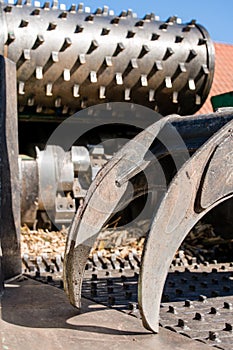 Industrial wood chipper in action