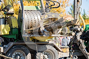 Industrial wood chipper in action