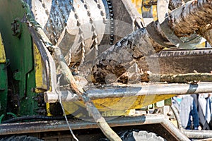 Industrial wood chipper in action