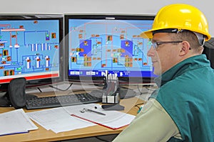 Industrial worker in control room