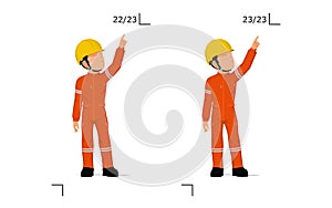 An industrial worker is explaining something over his head